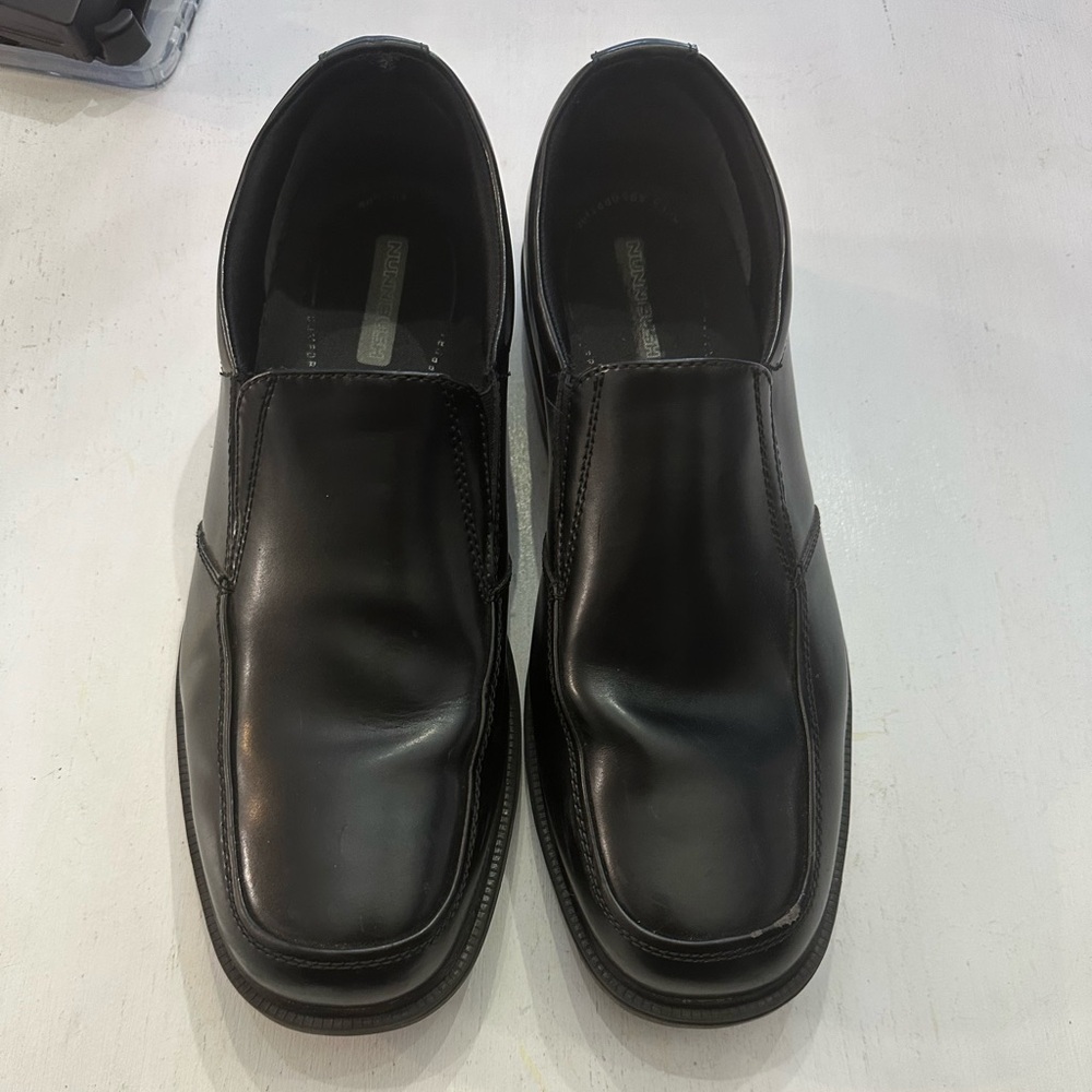 Nunn Bush black leather slip-on dress shoes